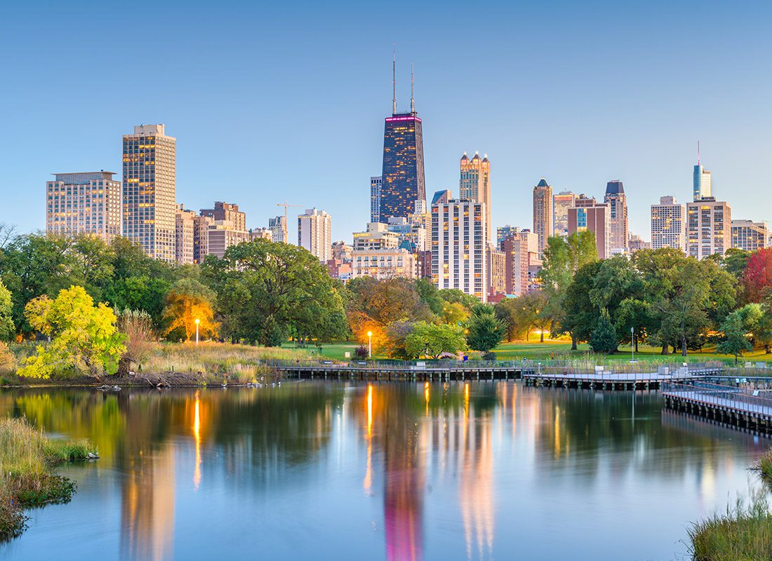 Contact - Aerial View of Chicago and a Park in the Foreground With a Lake and Trees